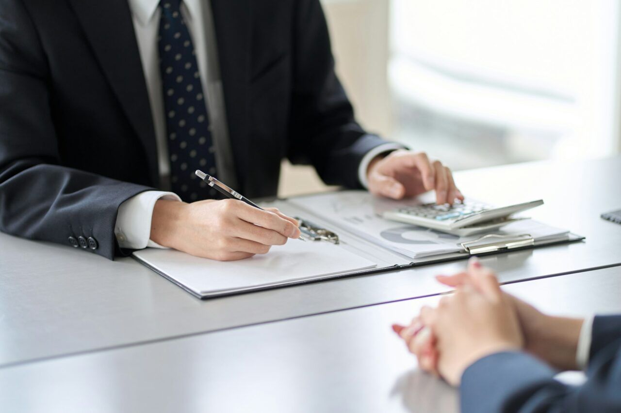 Accountant reviewing figures with a client
